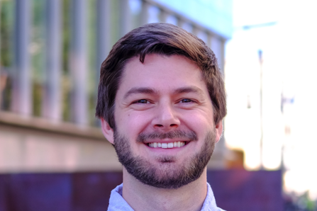 Headshot picture of Zachary Butzin Dozier